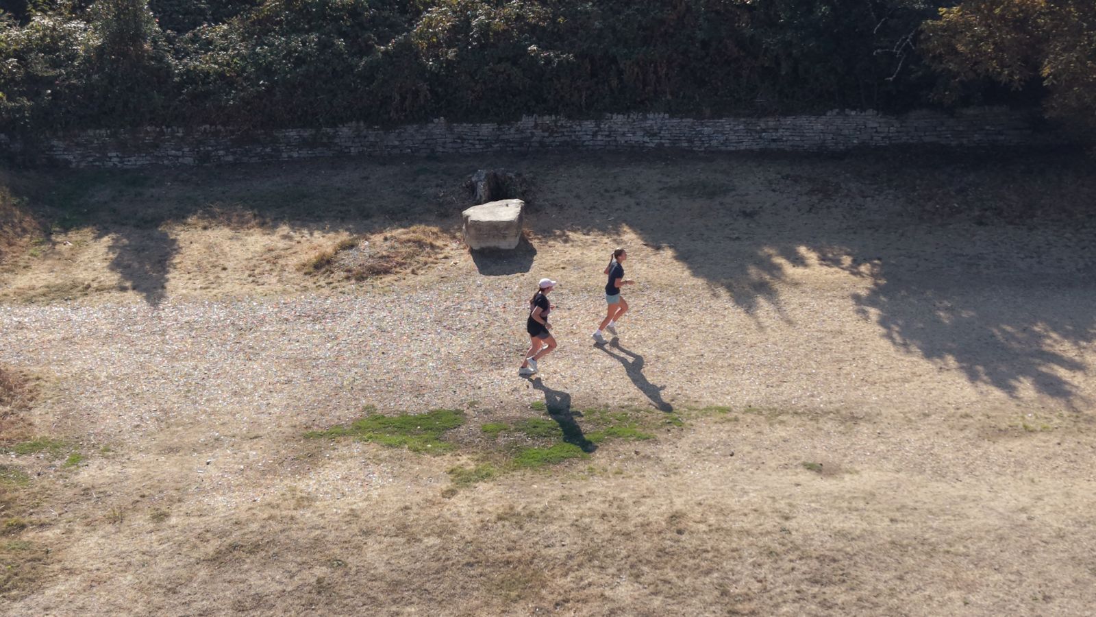 Two runners on the open trail through Meyrick Park