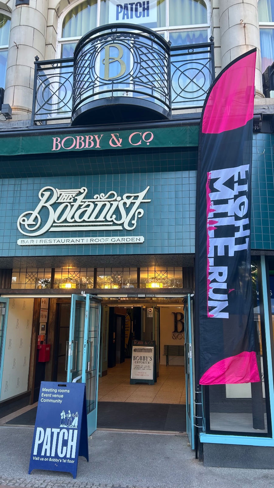 Eightmile flag outside the Bobby's & Co entrance to PATCH on race morning